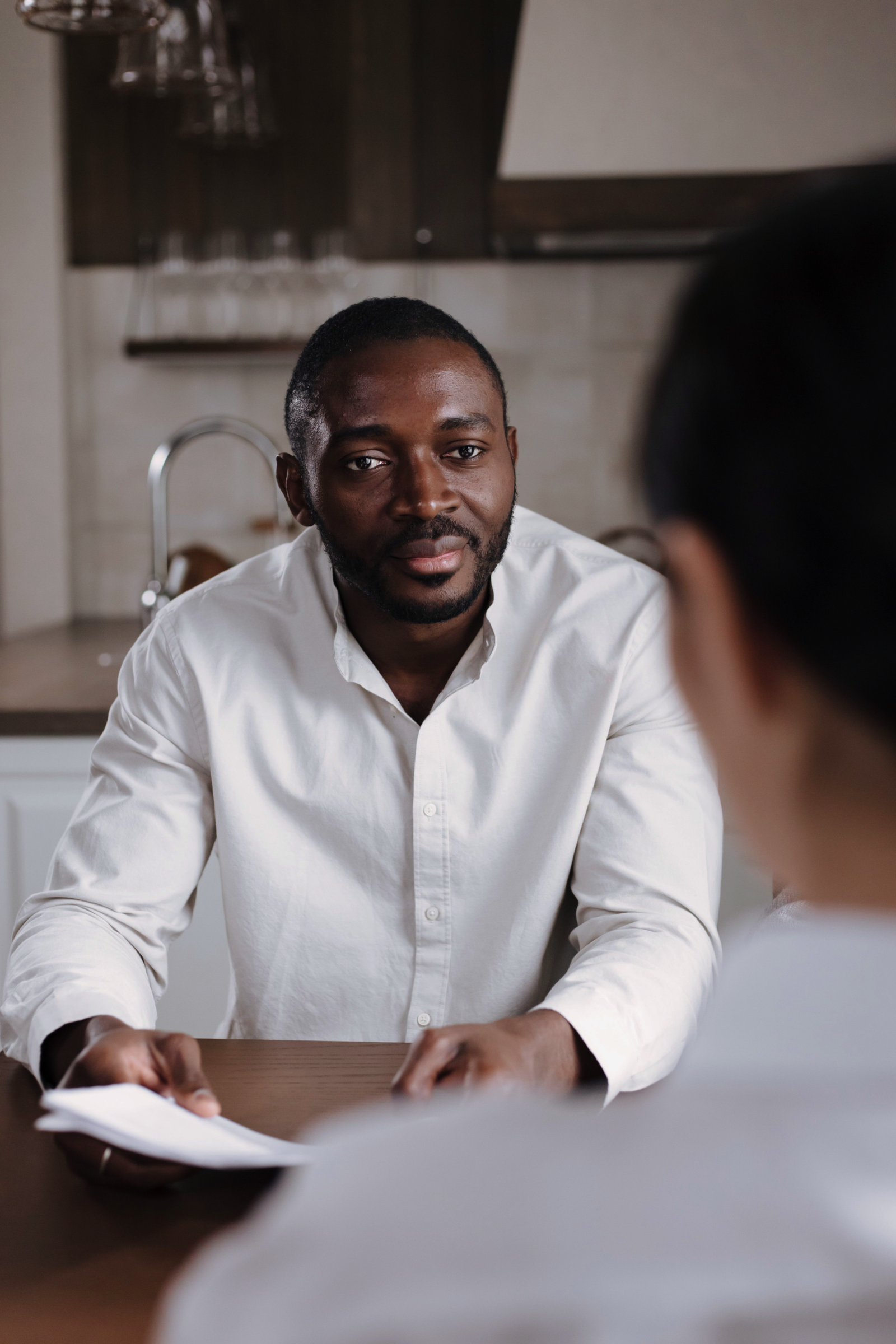 Two people talking during a counselling session